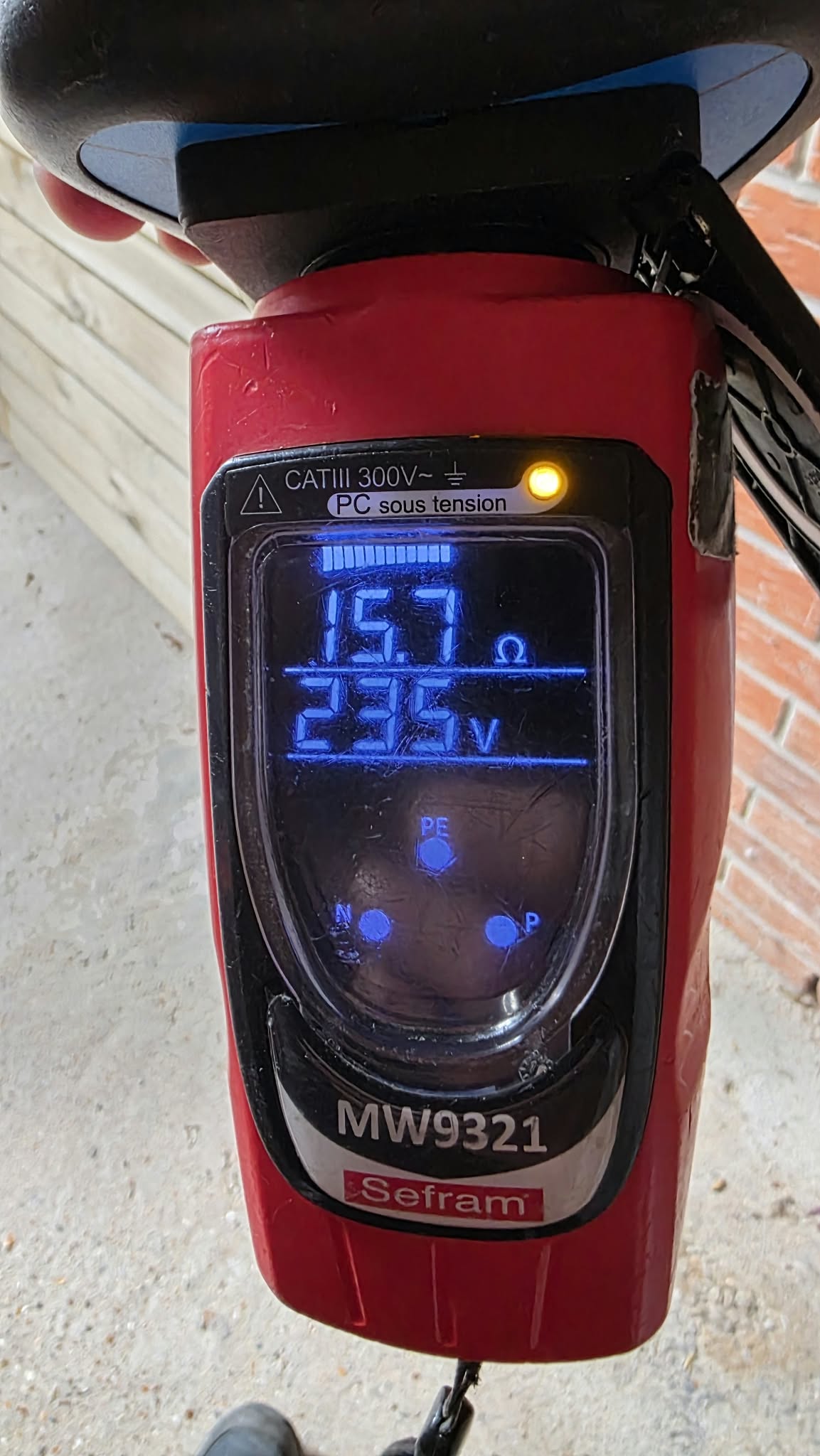 Contrôle à la borne après intervention : 15,7 ohms affichés